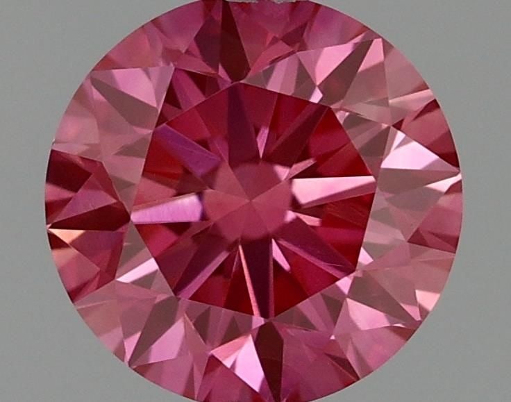Loose Diamond - ROUND 0.52ct Fancy Vivid Pink VVS1: Loose Diamond - ROUND 0.52ct Fancy Vivid Pink VVS1 Source: This is a real non-mined Diamond that has been grown in a lab Shape: ROUND Carats: 0.52 Color: Fancy Vivid Pink Certification: IGI Video: