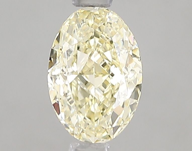 Loose Diamond - OVAL 1.07ct Fancy Light Yellow VS1: Loose Diamond - OVAL 1.07ct Fancy Light Yellow VS1 Source: This is a real non-mined Diamond that has been grown in a lab Shape: OVAL Carats: 1.07 Color: Fancy Light Yellow Certification: IGI Video: