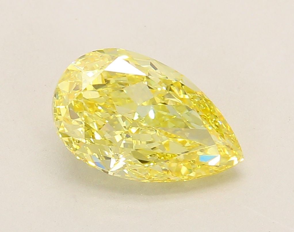 Loose Diamond - PEAR 2.61ct Fancy Vivid Yellow VVS2: Loose Diamond - PEAR 2.61ct Fancy Vivid Yellow VVS2 Source: This is a real non-mined Diamond that has been grown in a lab Shape: PEAR Carats: 2.61 Color: Fancy Vivid Yellow Certification: IGI Video: