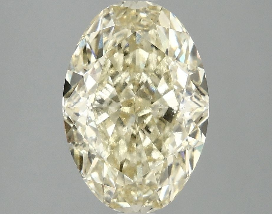 Loose Diamond - OVAL 3.1ct Fancy Intense Yellow VVS2: Loose Diamond - OVAL 3.1ct Fancy Intense Yellow VVS2 Source: This is a real non-mined Diamond that has been grown in a lab Shape: OVAL Carats: 3.1 Color: Fancy Intense Yellow Certification: IGI Video: