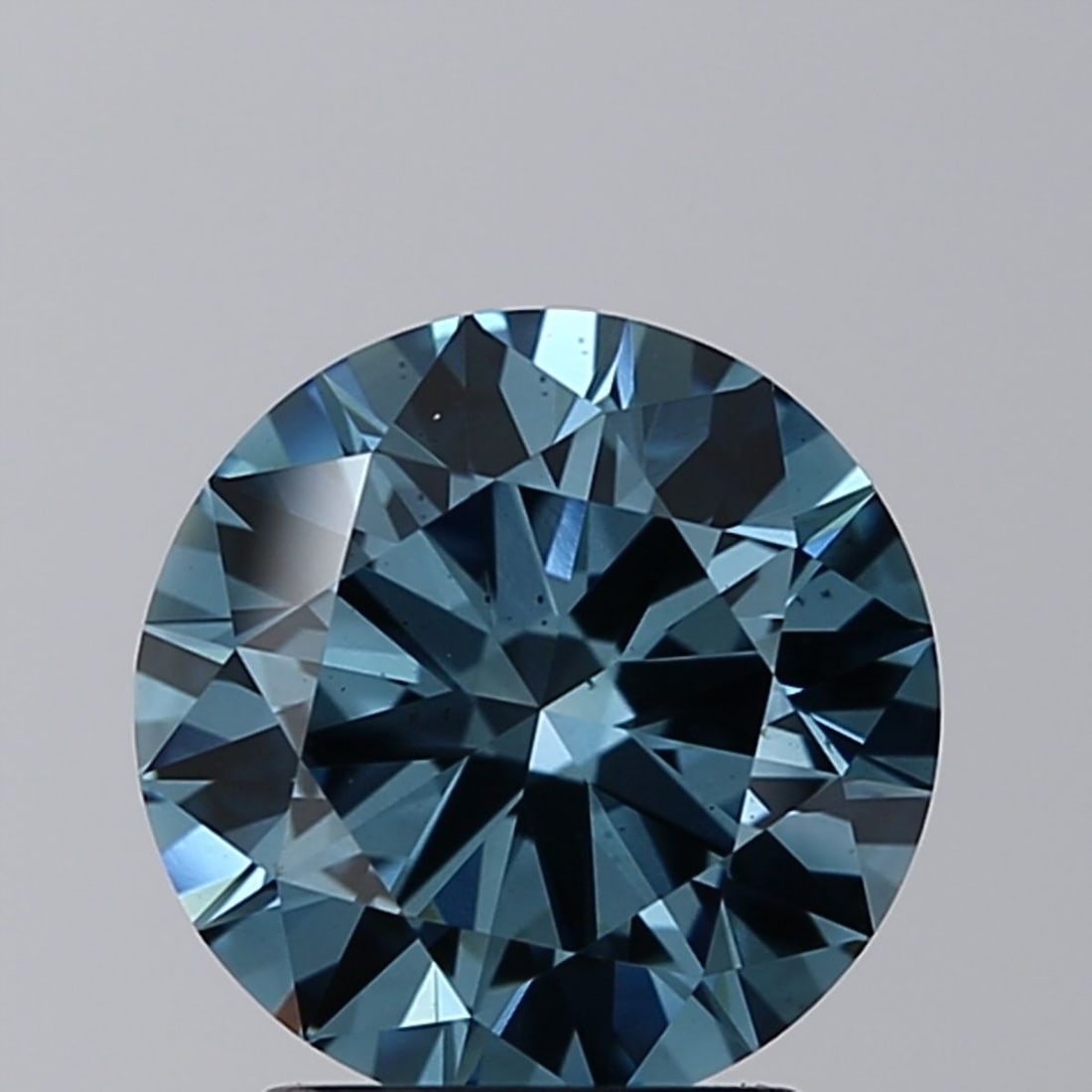 Ideal Loose Diamond - ROUND 2.01ct Fancy Vivid Blue VS2: Ideal Loose Diamond - ROUND 2.01ct Fancy Vivid Blue VS2 Source: This is a real non-mined Diamond that has been grown in a lab Shape: ROUND Carats: 2.01 Color: Fancy Vivid Blue Certification: IGI Video
