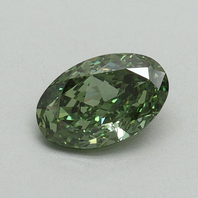 Loose Diamond - OVAL 0.52ct Fancy Vivid Green VVS2: Loose Diamond - OVAL 0.52ct Fancy Vivid Green VVS2 Source: This is a real non-mined Diamond that has been grown in a lab Shape: OVAL Carats: 0.52 Color: Fancy Vivid Green Certification: IGI Video: