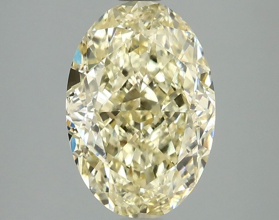 Loose Diamond - OVAL 3.08ct Fancy Yellow VS2: Loose Diamond - OVAL 3.08ct Fancy Yellow VS2 Source: This is a real non-mined Diamond that has been grown in a lab Shape: OVAL Carats: 3.08 Color: Fancy Yellow Certification: IGI Video:
