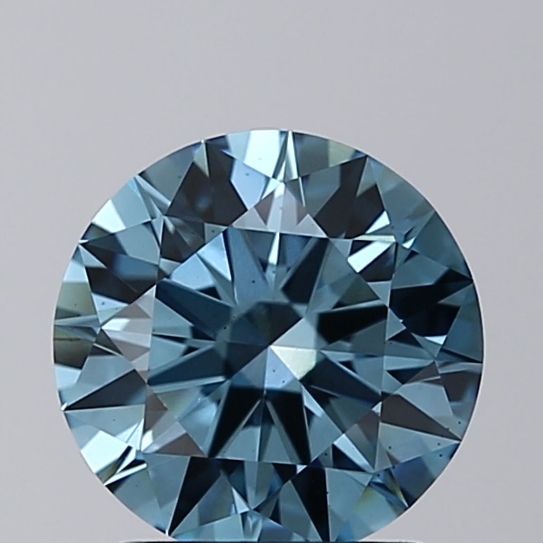 Ideal Loose Diamond - ROUND 1.57ct Fancy Vivid Blue VS2: Ideal Loose Diamond - ROUND 1.57ct Fancy Vivid Blue VS2 Source: This is a real non-mined Diamond that has been grown in a lab Shape: ROUND Carats: 1.57 Color: Fancy Vivid Blue Certification: IGI Video