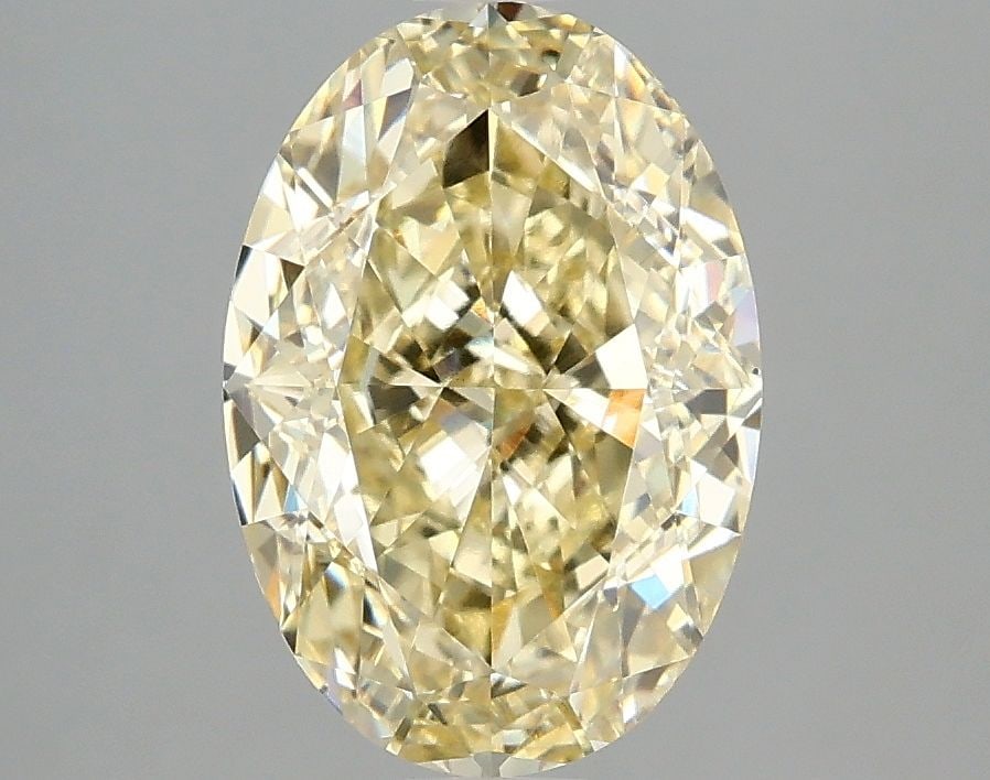 Loose Diamond - OVAL 3.01ct Fancy Intense Yellow VS1: Loose Diamond - OVAL 3.01ct Fancy Intense Yellow VS1 Source: This is a real non-mined Diamond that has been grown in a lab Shape: OVAL Carats: 3.01 Color: Fancy Intense Yellow Certification: IGI Video