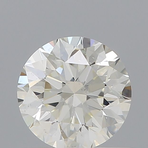 Loose Diamond - ROUND 0.7ct J SI1: Loose Diamond - ROUND 0.7ct J SI1 Source: Natural Shape: ROUND Carats: 0.7 Color: J Clarity: SI1 Certification: IGI Video: