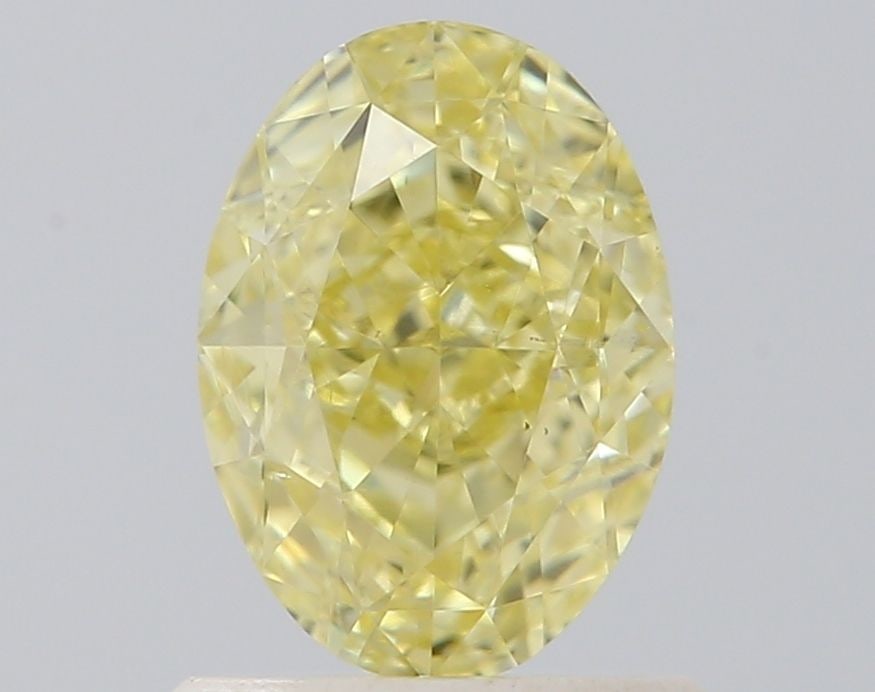 Loose Diamond - OVAL 1.03ct Yellow VS1: Loose Diamond - OVAL 1.03ct Yellow VS1 Source: Natural Shape: OVAL Carats: 1.03 Color: Yellow Certification: IGI Video: