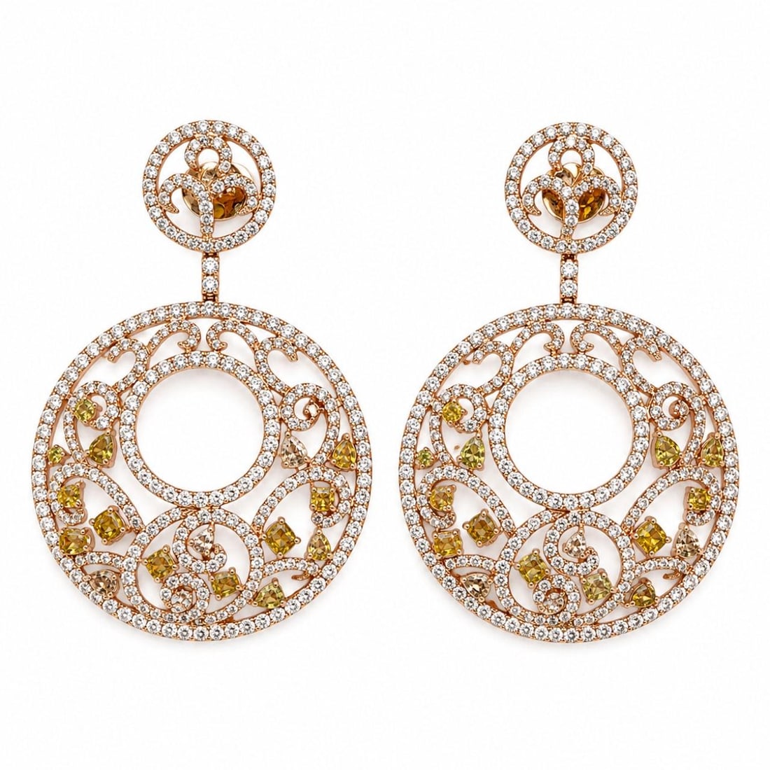 ODDELA diamond earrings 18K rose gold natural color: ODDELA diamond earrings 18K rose gold natural color These elegant earrings are crafted in 18K rose gold and feature a total of 36 natural fancy color diamonds weighing approximately 3.20 carats. Addit