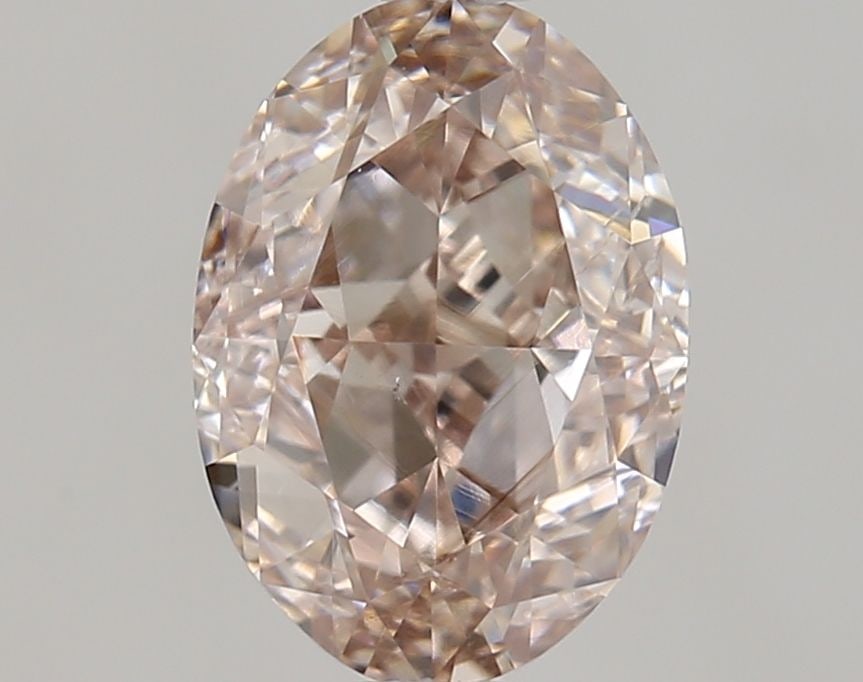 Loose Diamond - OVAL 0.9ct Fancy Pink Brown SI1: Loose Diamond - OVAL 0.9ct Fancy Pink Brown SI1 Source: Natural Shape: OVAL Carats: 0.9 Color: Fancy Pink Brown Certification: GIA Video: