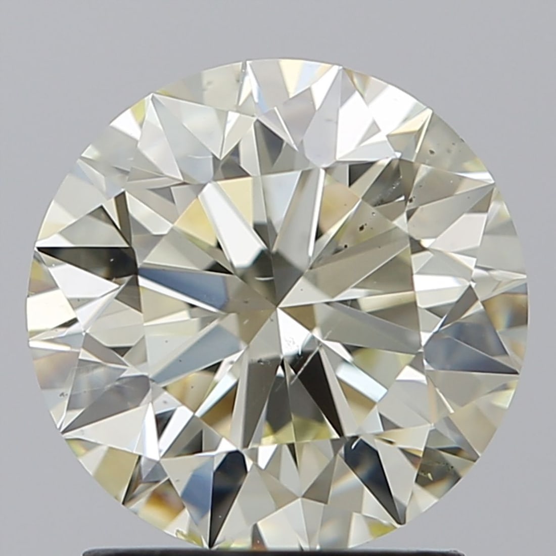 Loose Diamond - ROUND 1.91ct M SI1: Loose Diamond - ROUND 1.91ct M SI1 Source: Natural Shape: ROUND Carats: 1.91 Color: M Clarity: SI1 Certification: IGI Video: