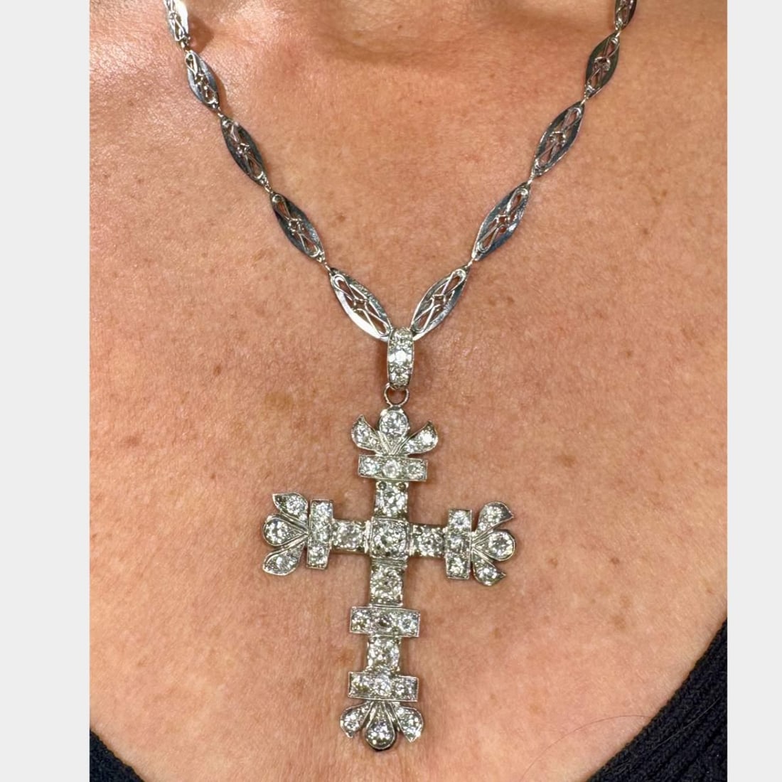 Art Deco Platinum Cross Necklace with 44 Diamonds 10.90 Ct: Art Deco Platinum Cross Necklace with 44 Diamonds 10.90 Ct This stunning Art Deco Platinum Diamond Cross Necklace showcases exceptional craftsmanship and timeless elegance. Weighing 37.4 grams, it fea