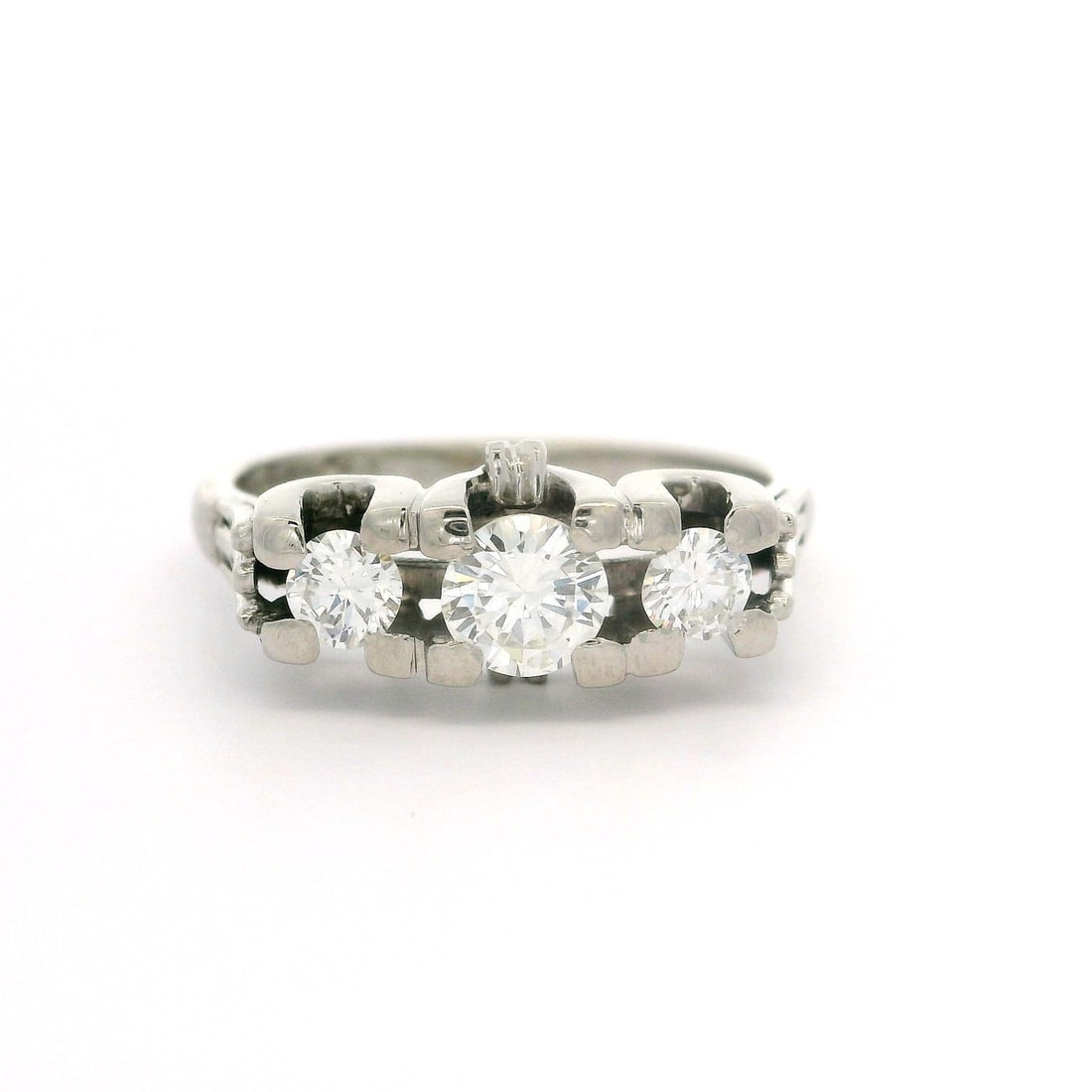 Vintage 18k White Gold 0.72ctw Diamond 3 Stone Ring: Vintage 18k White Gold 0.72ctw Diamond 3 Stone Ring This exquisite vintage English ring features a stunning combination of diamonds set in solid 18k white gold. The ring showcases a total carat weight