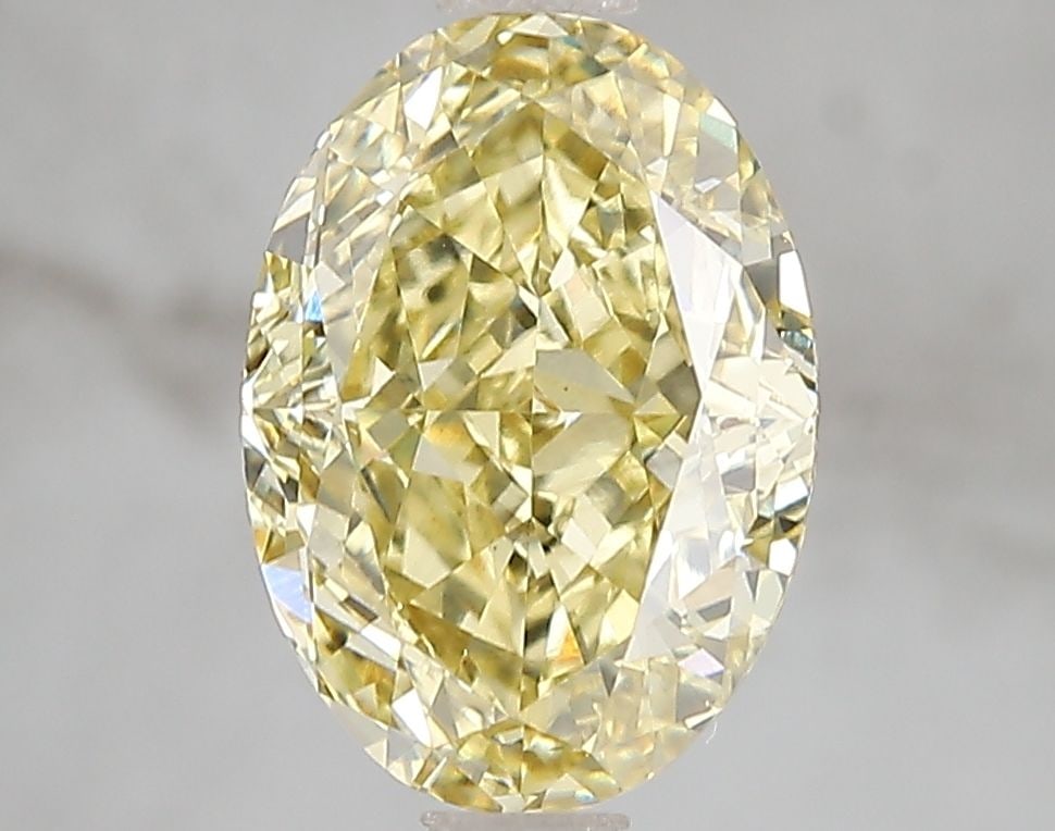 Loose Diamond - OVAL 3.09ct Fancy Intense Yellow VS2: Loose Diamond - OVAL 3.09ct Fancy Intense Yellow VS2 Source: This is a real non-mined Diamond that has been grown in a lab Shape: OVAL Carats: 3.09 Color: Fancy Intense Yellow Certification: IGI Video