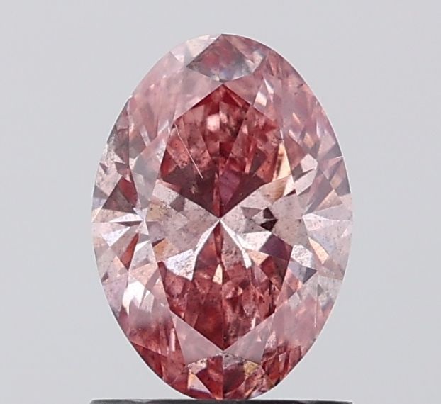 Loose Diamond - OVAL 1.07ct Fancy Vivid Brownish Pink I1: Loose Diamond - OVAL 1.07ct Fancy Vivid Brownish Pink I1 Source: This is a real non-mined Diamond that has been grown in a lab Shape: OVAL Carats: 1.07 Color: Fancy Vivid Brownish Pink Certification: 