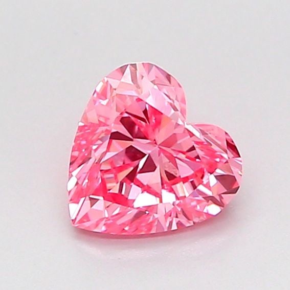 Loose Diamond - HEART 0.7ct Fancy Vivid Pink VS1: Loose Diamond - HEART 0.7ct Fancy Vivid Pink VS1 Source: This is a real non-mined Diamond that has been grown in a lab Shape: HEART Carats: 0.7 Color: Fancy Vivid Pink Certification: IGI Video:
