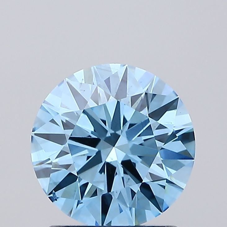 Ideal Loose Diamond - ROUND 1.49ct Fancy Vivid Blue VS2: Ideal Loose Diamond - ROUND 1.49ct Fancy Vivid Blue VS2 Source: This is a real non-mined Diamond that has been grown in a lab Shape: ROUND Carats: 1.49 Color: Fancy Vivid Blue Certification: IGI Video