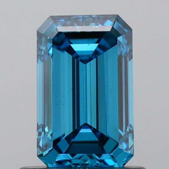 Loose Diamond - EMERALD 0.9ct Fancy Vivid Blue VS1: Loose Diamond - EMERALD 0.9ct Fancy Vivid Blue VS1 Source: This is a real non-mined Diamond that has been grown in a lab Shape: EMERALD Carats: 0.9 Color: Fancy Vivid Blue Certification: IGI Video: