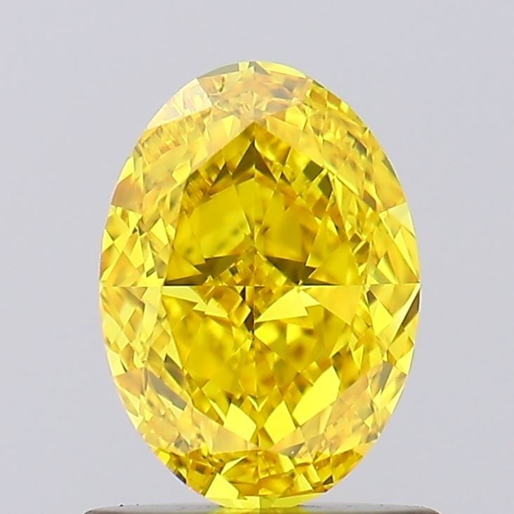 Loose Diamond - OVAL 1.0ct Fancy Vivid Yellow VVS2: Loose Diamond - OVAL 1.0ct Fancy Vivid Yellow VVS2 Source: This is a real non-mined Diamond that has been grown in a lab Shape: OVAL Carats: 1.0 Color: Fancy Vivid Yellow Certification: IGI Video: