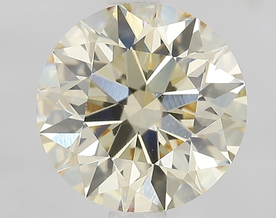 Loose Diamond - ROUND 2.08ct Fancy Light Yellow VVS2: Loose Diamond - ROUND 2.08ct Fancy Light Yellow VVS2 Source: This is a real non-mined Diamond that has been grown in a lab Shape: ROUND Carats: 2.08 Color: Fancy Light Yellow Certification: IGI Video: