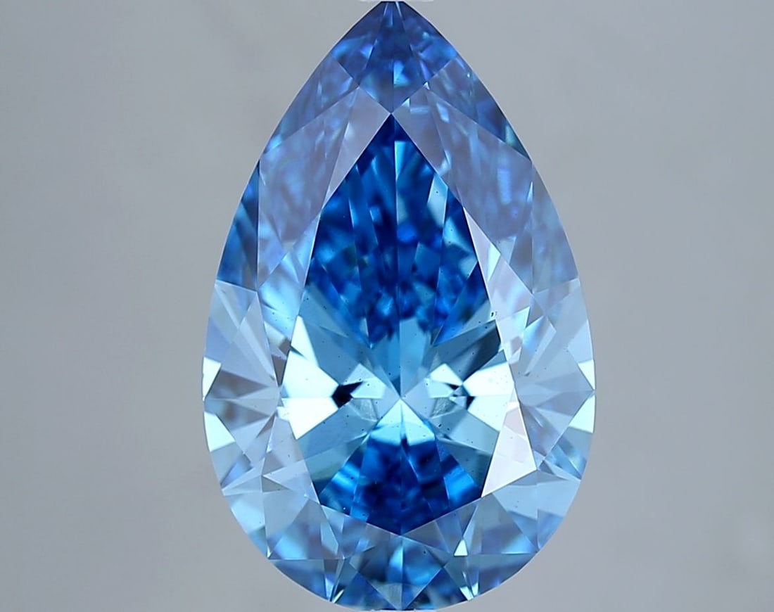 Loose Diamond - PEAR 5.26ct Fancy Vivid Blue VS2: Loose Diamond - PEAR 5.26ct Fancy Vivid Blue VS2 Source: This is a real non-mined Diamond that has been grown in a lab Shape: PEAR Carats: 5.26 Color: Fancy Vivid Blue Certification: IGI Video:
