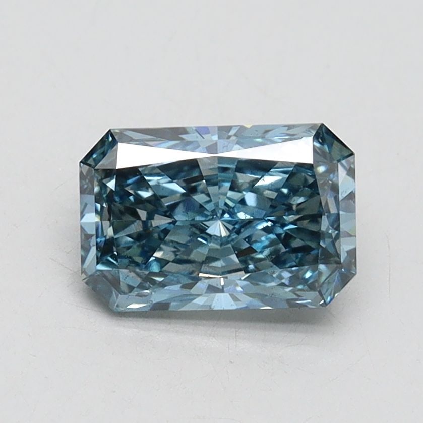 Loose Diamond - RADIANT 1.03ct Fancy Vivid Blue SI1: Loose Diamond - RADIANT 1.03ct Fancy Vivid Blue SI1 Source: This is a real non-mined Diamond that has been grown in a lab Shape: RADIANT Carats: 1.03 Color: Fancy Vivid Blue Certification: IGI Video: