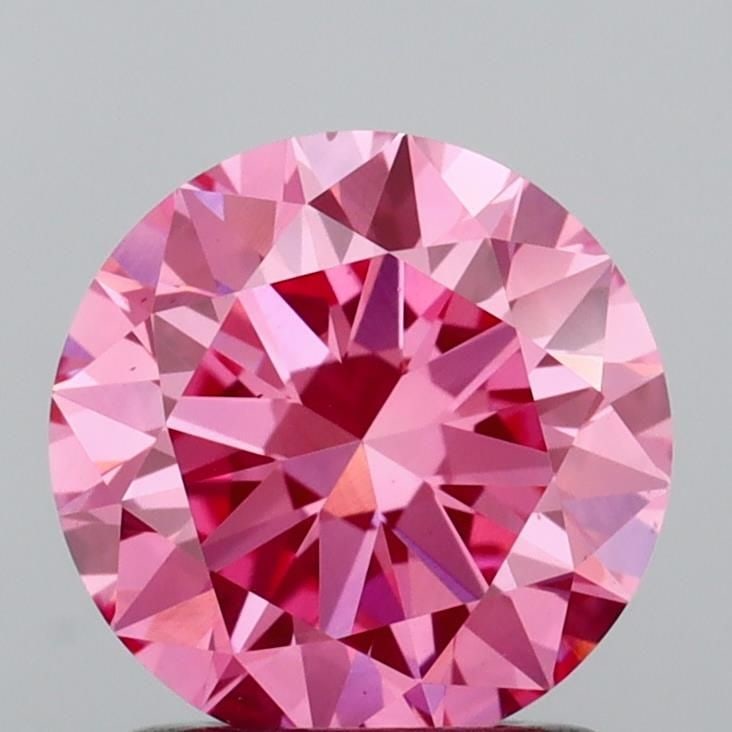 Ideal Loose Diamond - ROUND 1.34ct Fancy Vivid Pink VS1: Ideal Loose Diamond - ROUND 1.34ct Fancy Vivid Pink VS1 Source: This is a real non-mined Diamond that has been grown in a lab Shape: ROUND Carats: 1.34 Color: Fancy Vivid Pink Certification: IGI Video