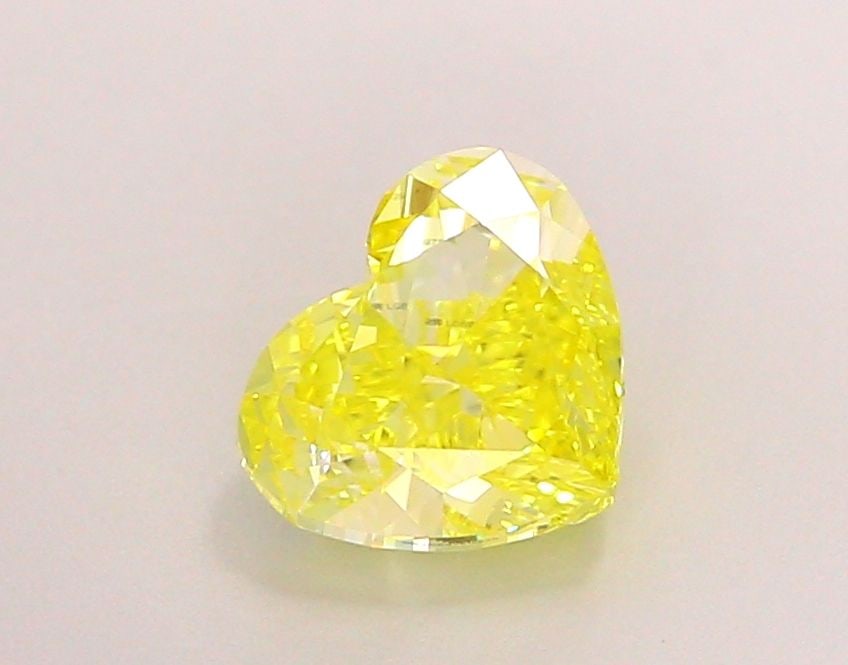 Loose Diamond - HEART 1.5ct Fancy Vivid Yellow VS2: Loose Diamond - HEART 1.5ct Fancy Vivid Yellow VS2 Source: This is a real non-mined Diamond that has been grown in a lab Shape: HEART Carats: 1.5 Color: Fancy Vivid Yellow Certification: IGI Video: