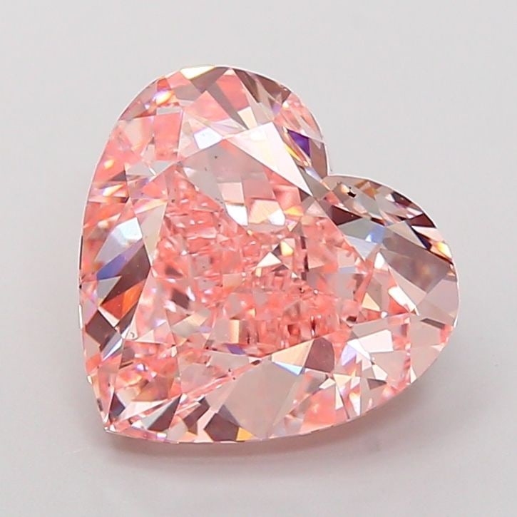 Loose Diamond - HEART 7.08ct Fancy Vivid Pink VS2: Loose Diamond - HEART 7.08ct Fancy Vivid Pink VS2 Source: This is a real non-mined Diamond that has been grown in a lab Shape: HEART Carats: 7.08 Color: Fancy Vivid Pink Certification: IGI Video: