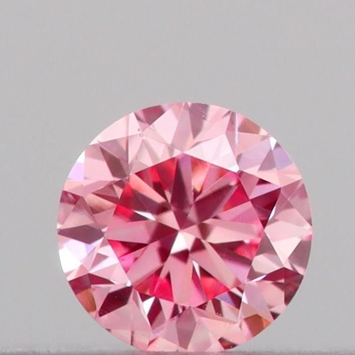 Loose Diamond - ROUND 0.09ct Fancy Vivid Pink VVS2: Loose Diamond - ROUND 0.09ct Fancy Vivid Pink VVS2 Source: This is a real non-mined Diamond that has been grown in a lab Shape: ROUND Carats: 0.09 Color: Fancy Vivid Pink Certification: IGI Video: