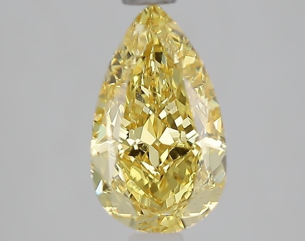 Loose Diamond - PEAR 1.59ct Fancy Vivid Yellow VS1: Loose Diamond - PEAR 1.59ct Fancy Vivid Yellow VS1 Source: This is a real non-mined Diamond that has been grown in a lab Shape: PEAR Carats: 1.59 Color: Fancy Vivid Yellow Certification: IGI Video: