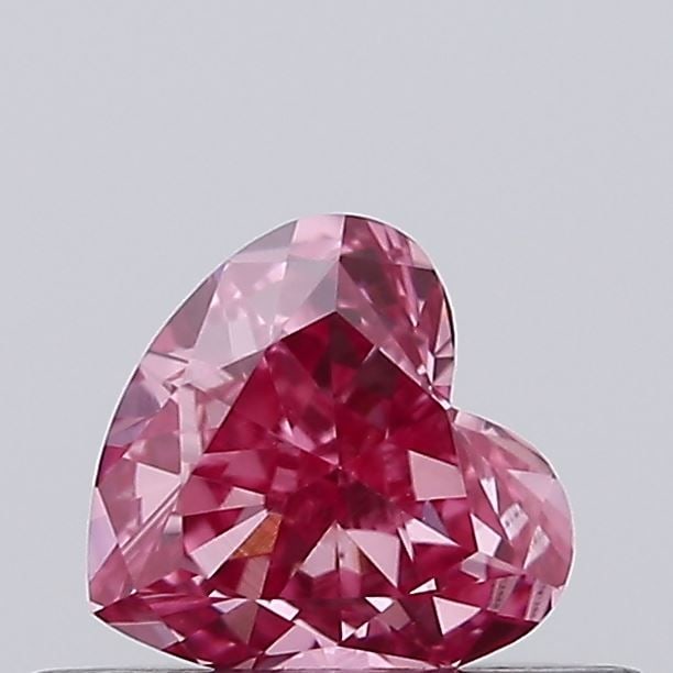 Loose Diamond - HEART 0.38ct Fancy Vivid Pink VVS2: Loose Diamond - HEART 0.38ct Fancy Vivid Pink VVS2 Source: This is a real non-mined Diamond that has been grown in a lab Shape: HEART Carats: 0.38 Color: Fancy Vivid Pink Certification: IGI Video: