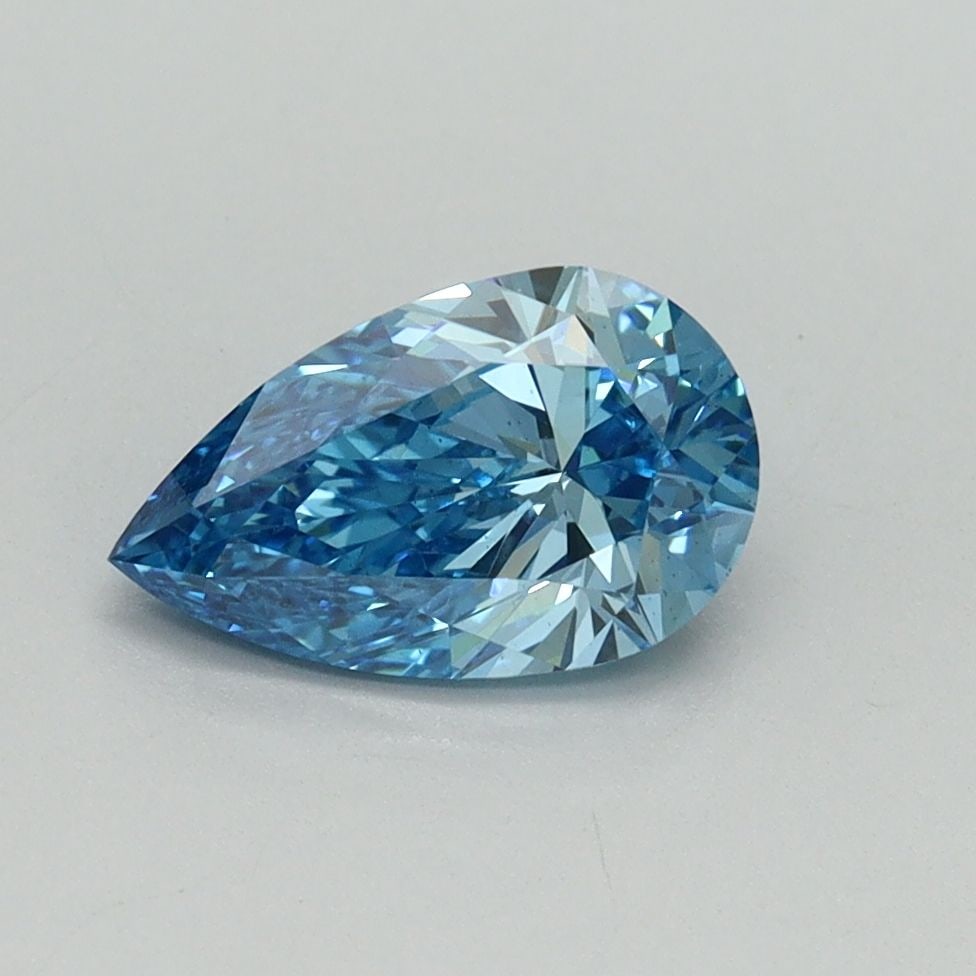 Loose Diamond - PEAR 1.0ct Fancy Vivid Blue VS2: Loose Diamond - PEAR 1.0ct Fancy Vivid Blue VS2 Source: This is a real non-mined Diamond that has been grown in a lab Shape: PEAR Carats: 1.0 Color: Fancy Vivid Blue Certification: IGI Video: Video
