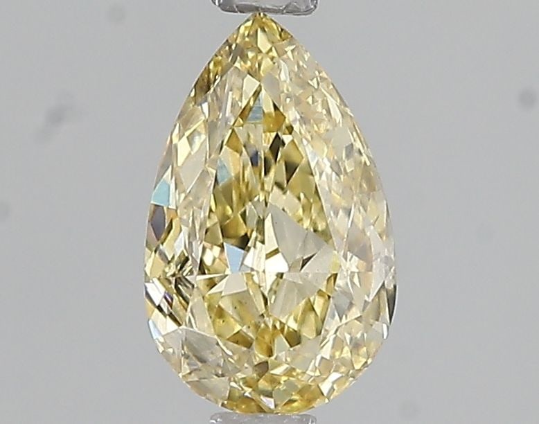 Loose Diamond - PEAR 1.04ct Fancy Intense Yellow VS1: Loose Diamond - PEAR 1.04ct Fancy Intense Yellow VS1 Source: This is a real non-mined Diamond that has been grown in a lab Shape: PEAR Carats: 1.04 Color: Fancy Intense Yellow Certification: IGI Video