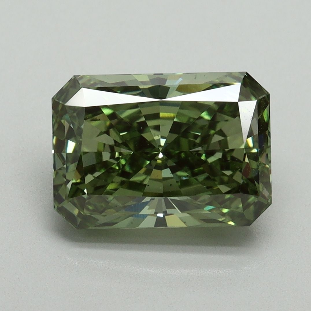 Loose Diamond - RADIANT 3.11ct Fancy Vivid Green VS2: Loose Diamond - RADIANT 3.11ct Fancy Vivid Green VS2 Source: This is a real non-mined Diamond that has been grown in a lab Shape: RADIANT Carats: 3.11 Color: Fancy Vivid Green Certification: IGI Video