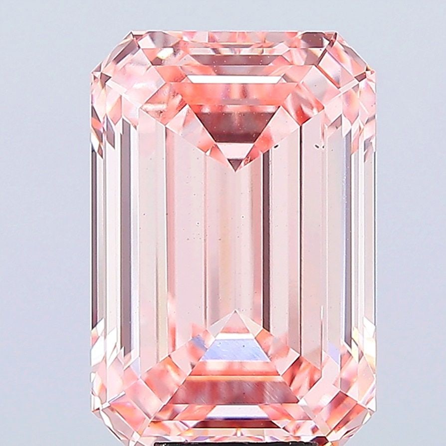 Loose Diamond - EMERALD 10.01ct Fancy Vivid Pink VS1: Loose Diamond - EMERALD 10.01ct Fancy Vivid Pink VS1 Source: This is a real non-mined Diamond that has been grown in a lab Shape: EMERALD Carats: 10.01 Color: Fancy Vivid Pink Certification: IGI Video