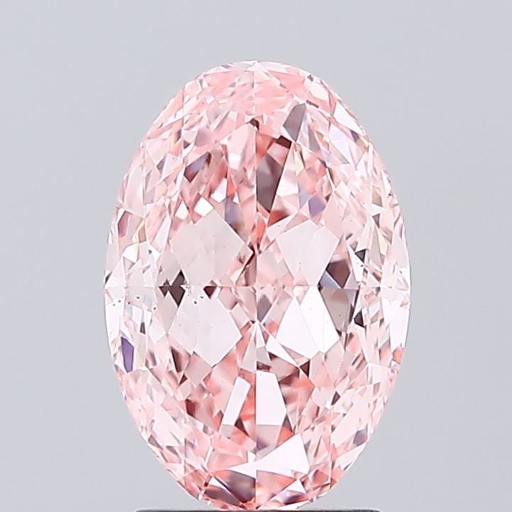 Loose Diamond - OVAL 2.12ct Fancy Vivid Pink VS1: Loose Diamond - OVAL 2.12ct Fancy Vivid Pink VS1 Source: This is a real non-mined Diamond that has been grown in a lab Shape: OVAL Carats: 2.12 Color: Fancy Vivid Pink Certification: IGI Video: