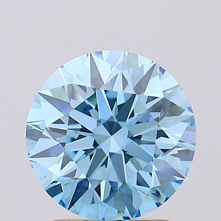 Loose Diamond - ROUND 2.05ct Fancy Vivid Blue VS1: Loose Diamond - ROUND 2.05ct Fancy Vivid Blue VS1 Source: This is a real non-mined Diamond that has been grown in a lab Shape: ROUND Carats: 2.05 Color: Fancy Vivid Blue Certification: IGI Video: