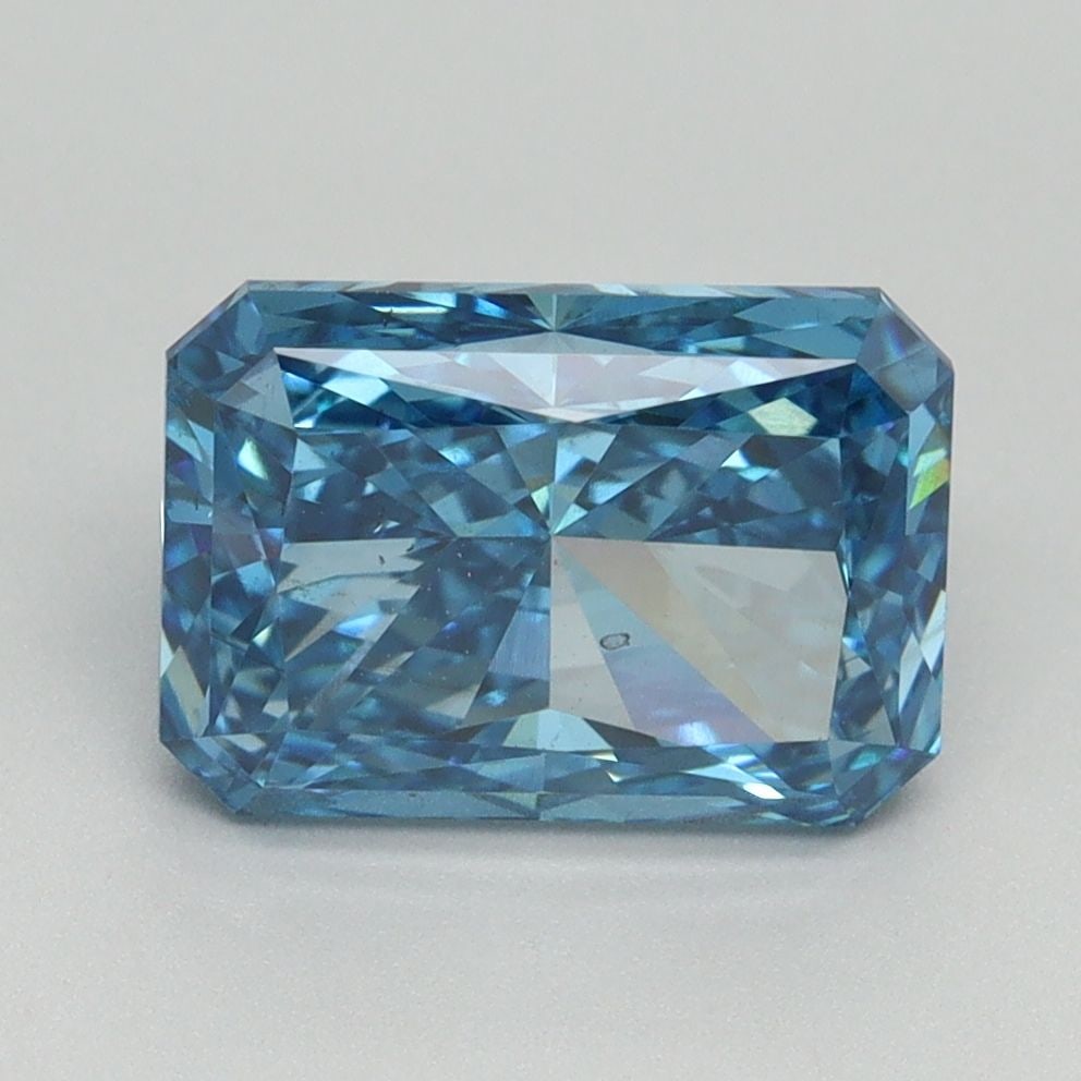 Loose Diamond - RADIANT 3.11ct Fancy Vivid Blue VS2: Loose Diamond - RADIANT 3.11ct Fancy Vivid Blue VS2 Source: This is a real non-mined Diamond that has been grown in a lab Shape: RADIANT Carats: 3.11 Color: Fancy Vivid Blue Certification: IGI Video: