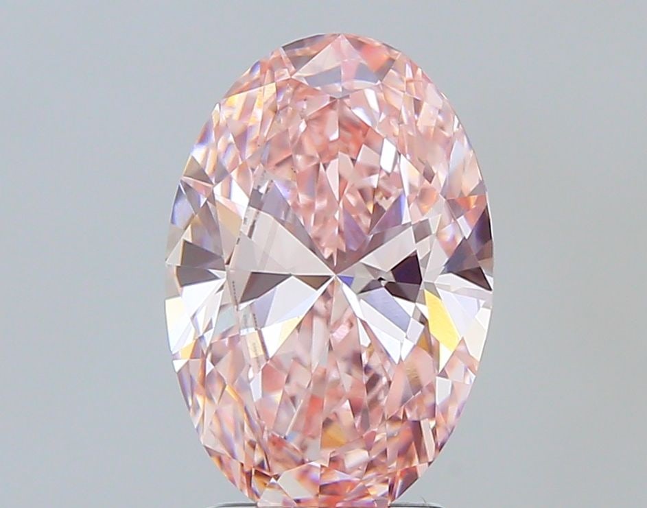 Loose Diamond - OVAL 3.03ct Fancy Vivid Pink VS2: Loose Diamond - OVAL 3.03ct Fancy Vivid Pink VS2 Source: This is a real non-mined Diamond that has been grown in a lab Shape: OVAL Carats: 3.03 Color: Fancy Vivid Pink Certification: IGI Video:
