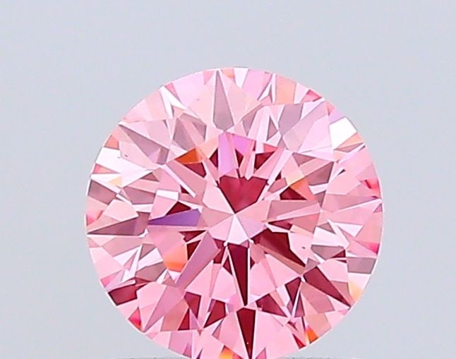 Ideal Loose Diamond - ROUND 1.05ct Fancy Vivid Pink VS1: Ideal Loose Diamond - ROUND 1.05ct Fancy Vivid Pink VS1 Source: This is a real non-mined Diamond that has been grown in a lab Shape: ROUND Carats: 1.05 Color: Fancy Vivid Pink Certification: IGI Video