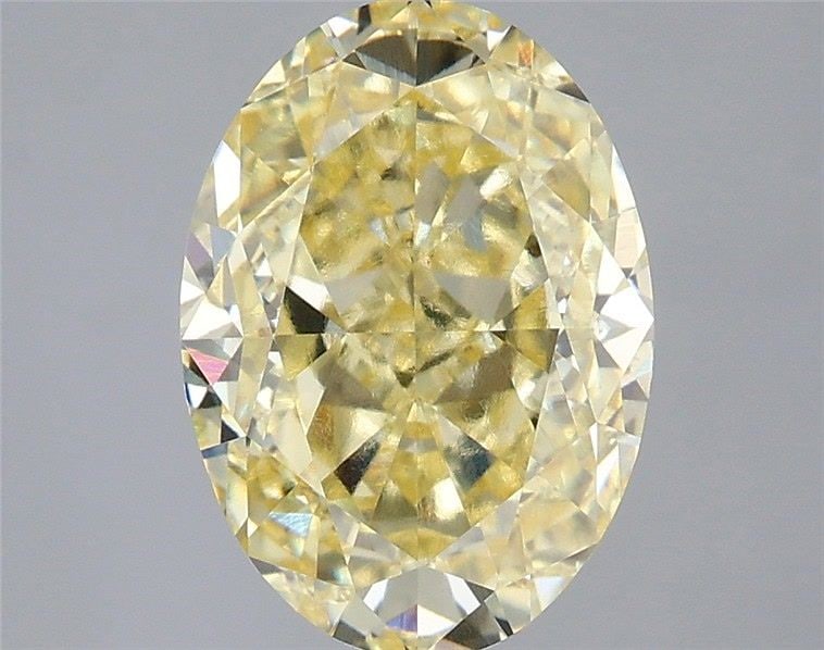 Loose Diamond - OVAL 3.6ct Fancy Yellow VS1: Loose Diamond - OVAL 3.6ct Fancy Yellow VS1 Source: This is a real non-mined Diamond that has been grown in a lab Shape: OVAL Carats: 3.6 Color: Fancy Yellow Certification: IGI Video: