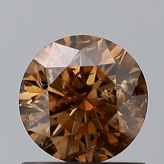 Loose Diamond - ROUND 0.71ct Brown SI2: Loose Diamond - ROUND 0.71ct Brown SI2 Source: Natural Shape: ROUND Carats: 0.71 Color: Brown Certification: NONE Video: Video Link The Diamond Depot Guarantee: All items in this auction are