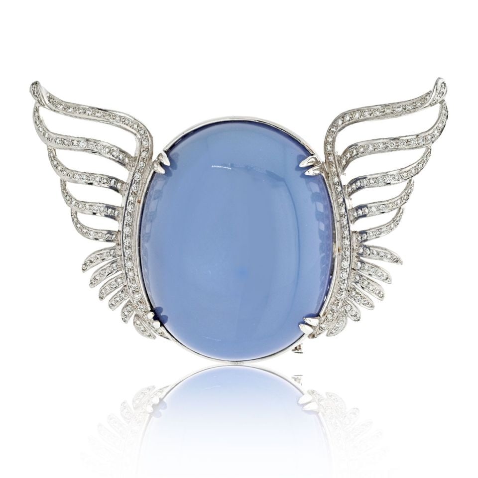 18K White Gold Quartz and Diamond Wings Brooch 7 Cts: 18K White Gold Quartz and Diamond Wings Brooch 7 Cts Elevate your style with this stunning 18K White Gold Large Quartz and Diamond Wings Brooch. This exquisite piece showcases a custom-made design,