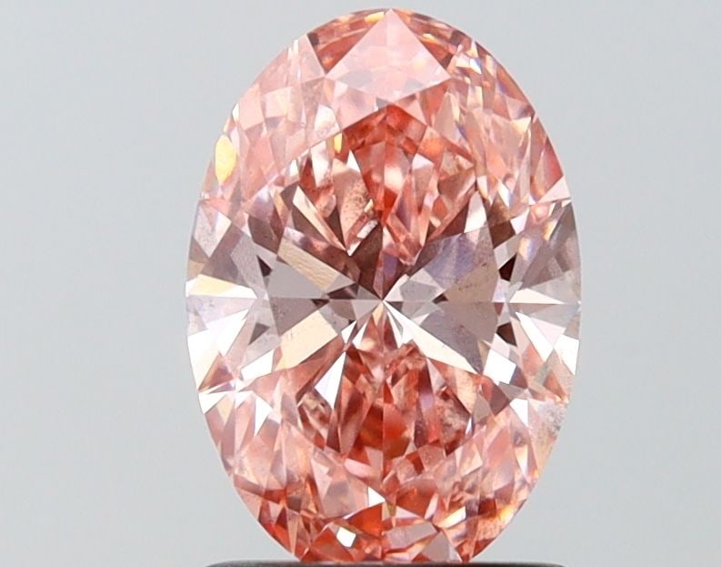 Loose Diamond - OVAL 1.48ct Fancy Vivid Pink VS2: Loose Diamond - OVAL 1.48ct Fancy Vivid Pink VS2 Source: This is a real non-mined Diamond that has been grown in a lab Shape: OVAL Carats: 1.48 Color: Fancy Vivid Pink Certification: IGI Video: Video