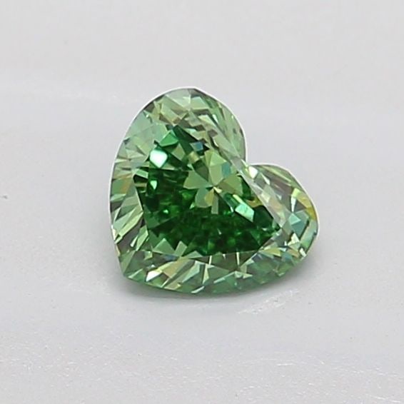 Loose Diamond - HEART 0.56ct Fancy Vivid Green VVS2: Loose Diamond - HEART 0.56ct Fancy Vivid Green VVS2 Source: This is a real non-mined Diamond that has been grown in a lab Shape: HEART Carats: 0.56 Color: Fancy Vivid Green Certification: IGI Video: