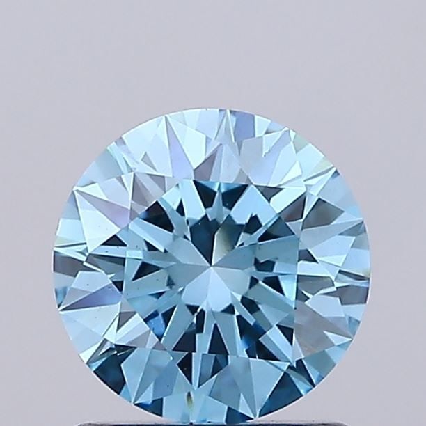 Loose Diamond - ROUND 1.04ct Fancy Vivid Blue VS2: Loose Diamond - ROUND 1.04ct Fancy Vivid Blue VS2 Source: This is a real non-mined Diamond that has been grown in a lab Shape: ROUND Carats: 1.04 Color: Fancy Vivid Blue Certification: IGI Video: