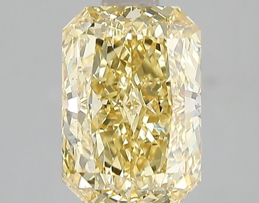 Loose Diamond - RADIANT 2.1ct Fancy Vivid Yellow VS2: Loose Diamond - RADIANT 2.1ct Fancy Vivid Yellow VS2 Source: This is a real non-mined Diamond that has been grown in a lab Shape: RADIANT Carats: 2.1 Color: Fancy Vivid Yellow Certification: IGI Video