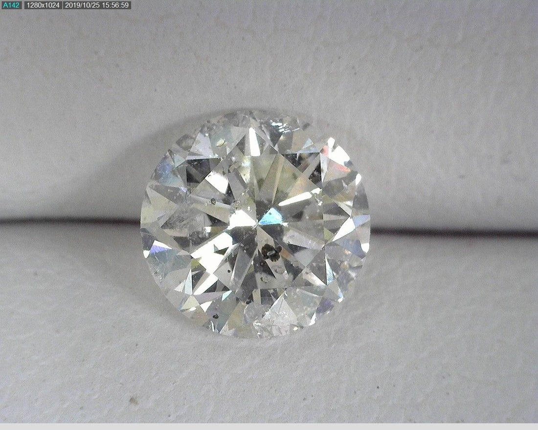 Loose Diamond - ROUND 1.0ct F I1: Loose Diamond - ROUND 1.0ct F I1 Source: Natural Shape: ROUND Carats: 1.0 Color: F Clarity: I1 Certification: OTHER The Diamond Depot Guarantee: All items in this auction are guaranteed to be 100% aut