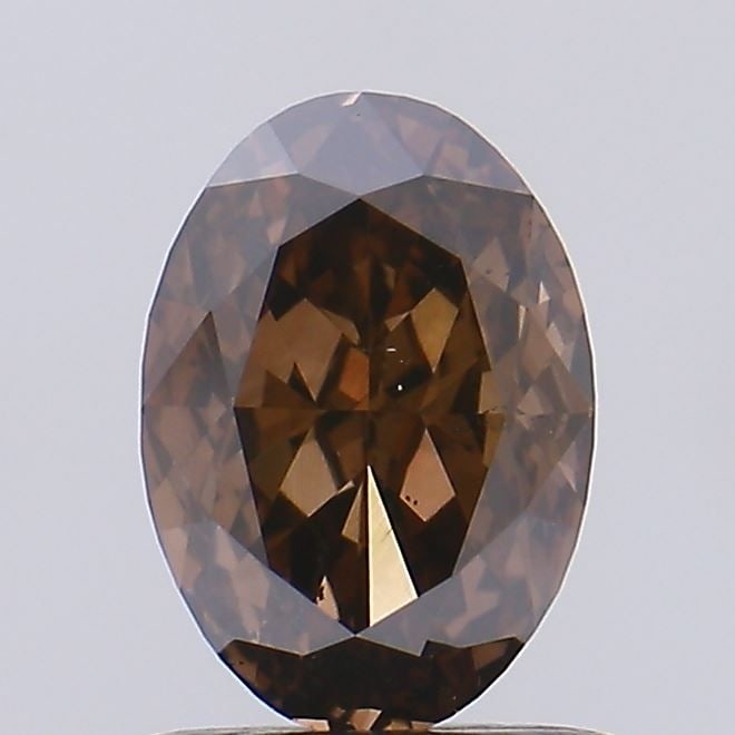 Loose Diamond - OVAL 1.01ct Fancy Reddish Brown SI1: Loose Diamond - OVAL 1.01ct Fancy Reddish Brown SI1 Source: Natural Shape: OVAL Carats: 1.01 Color: Fancy Reddish Brown Certification: NONE Video: