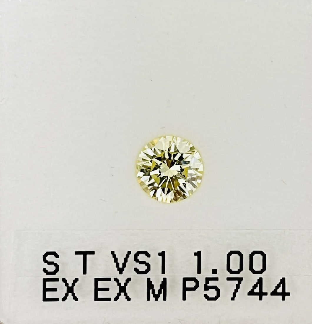 Loose Diamond - ROUND 1.0ct S-T VS1: Loose Diamond - ROUND 1.0ct S-T VS1 Source: Natural Shape: ROUND Carats: 1.0 Color: S-T Certification: GIA The Diamond Depot Guarantee: All items in this auction are guaranteed to be 100% authentic.